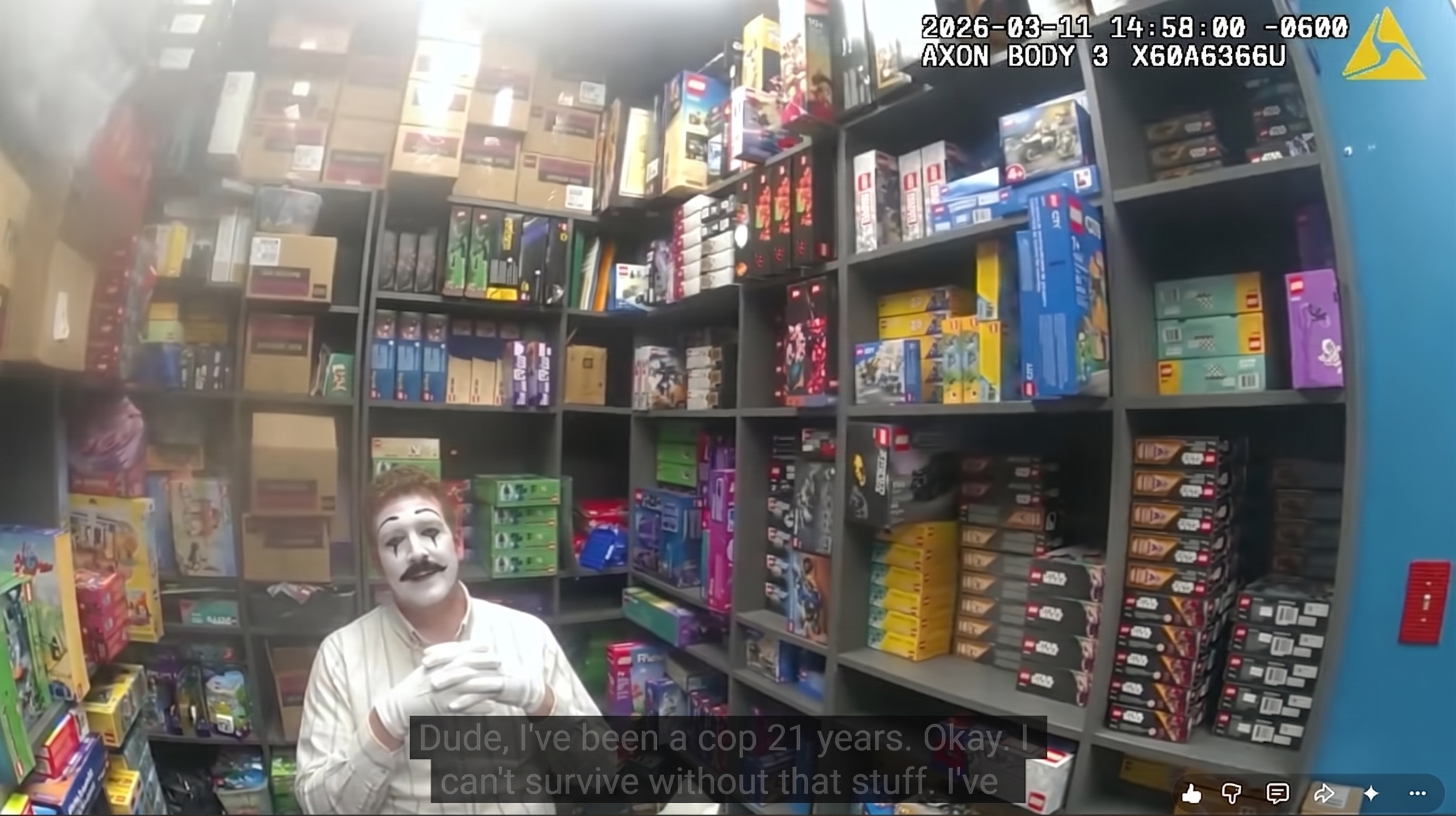 Bodycam frame capturing Senior Auditor Hammond 'Stache' Vance in a high-density asset storage room, sporting official mime makeup and white performance gloves